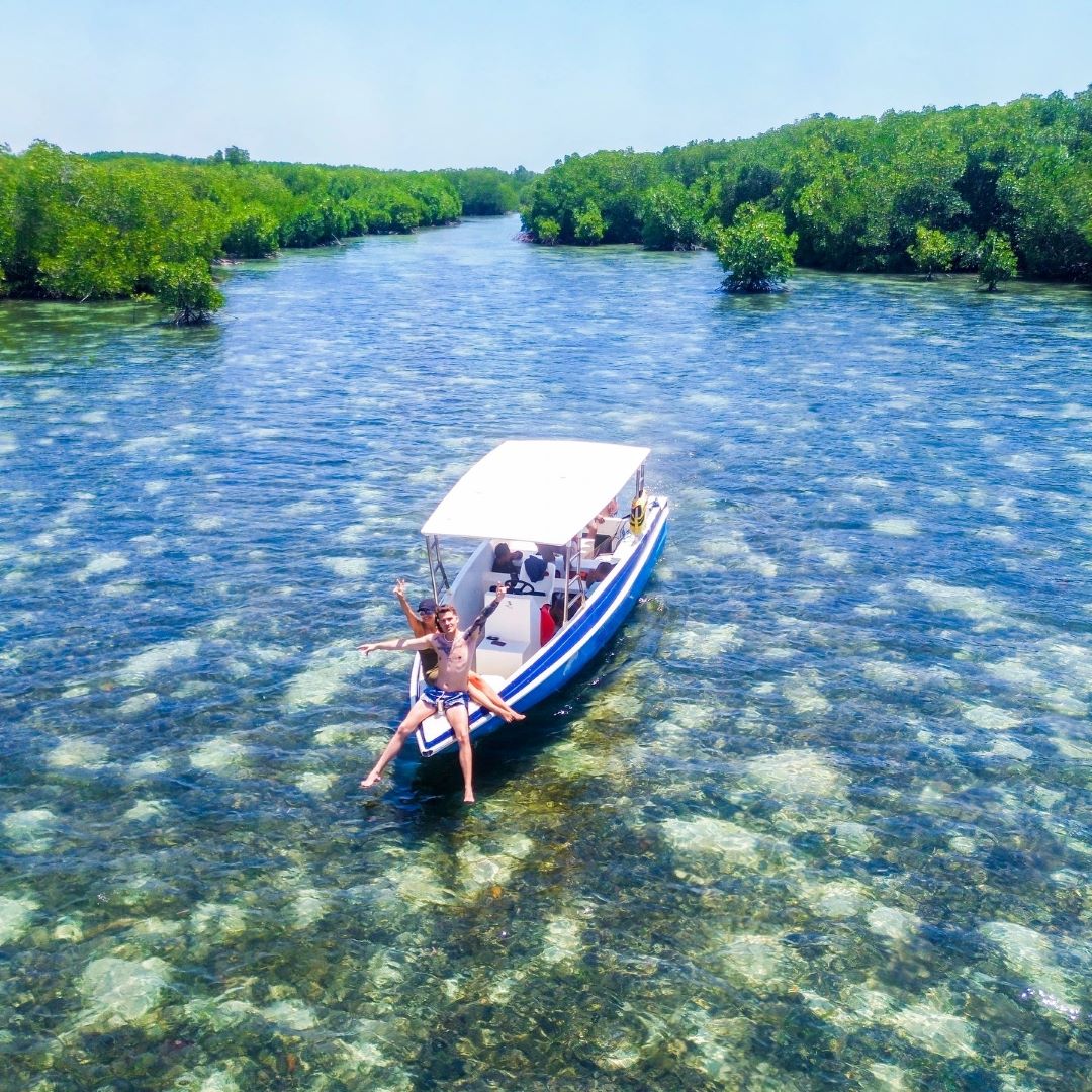 Exploring the dense mangrove forest at Gili Petagan